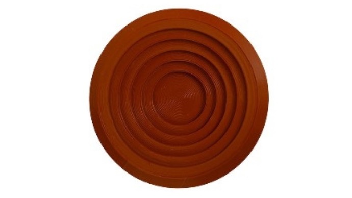 Patère ronde brun avec cercles concentriques en relief.